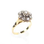 An 18ct gold and diamond cluster ring, set with nine brilliant cut diamonds,
