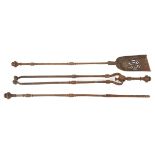 Set of three Georgian steel fire tools, comprising: tongs, a pocker and a shovel,