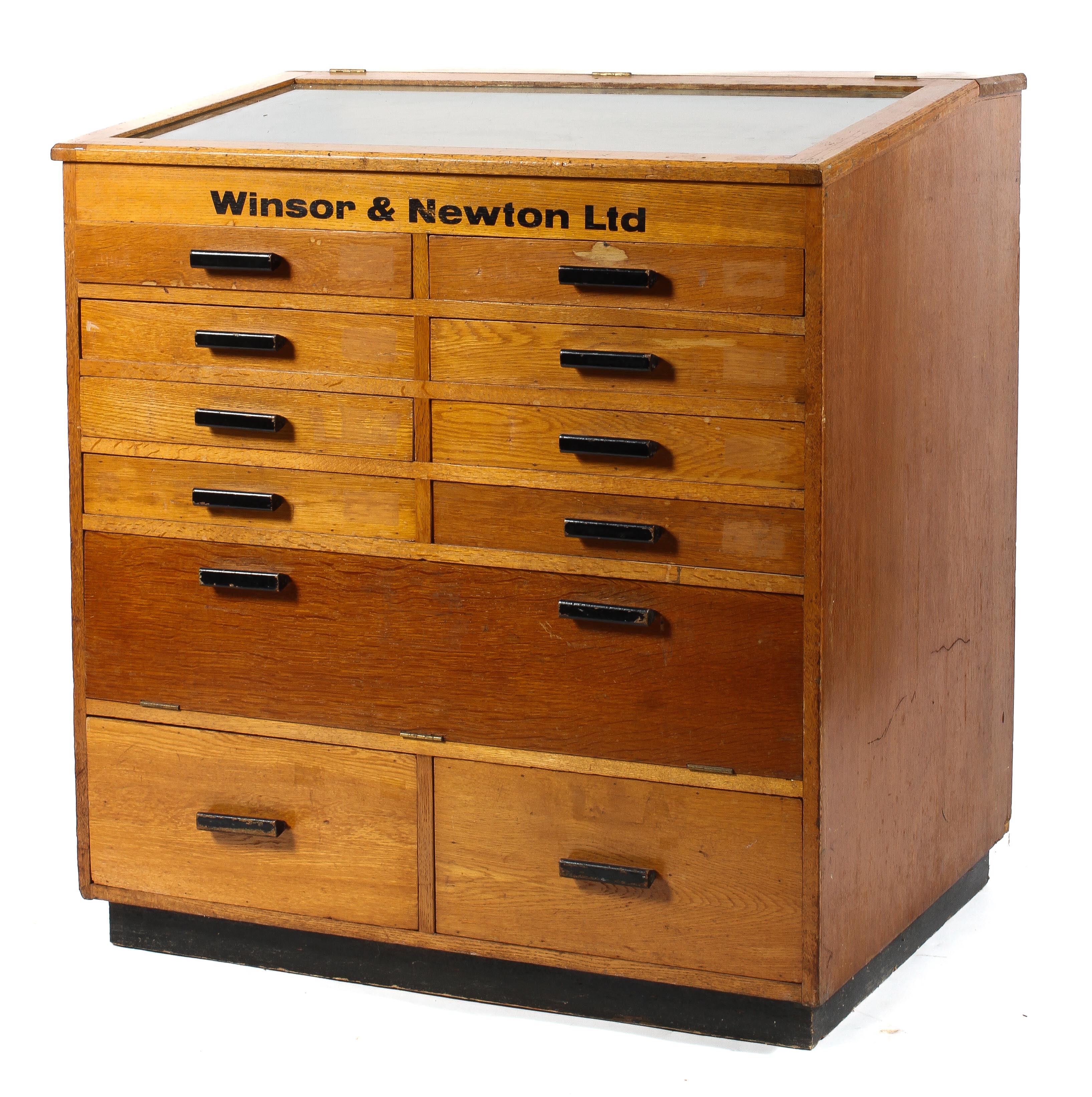A beech shop counter cabinet, stamped Windsor and Newton,