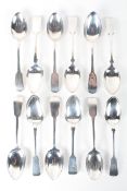 An assortment of twelve Victorian and later silver dessert spoons,