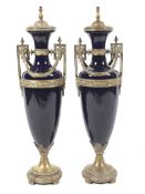 A large pair of French neoclassical style oviform gilt-metal mounted dark-blue ground Sevres-style