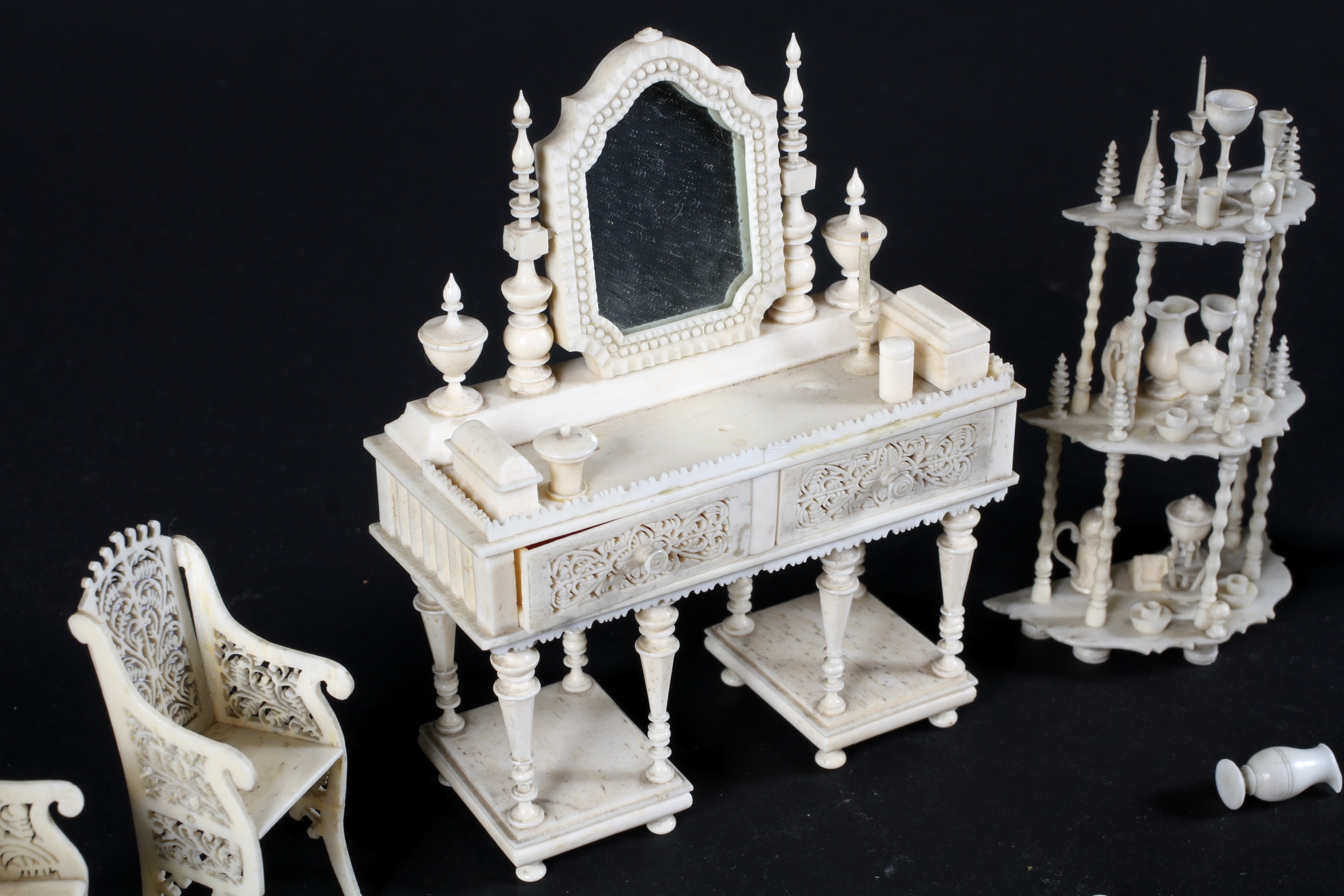 A collection of late 19th century carved ivory doll's house furniture, carved with frettwork, - Image 2 of 2