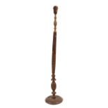 A carved sandlewood standard lamp,