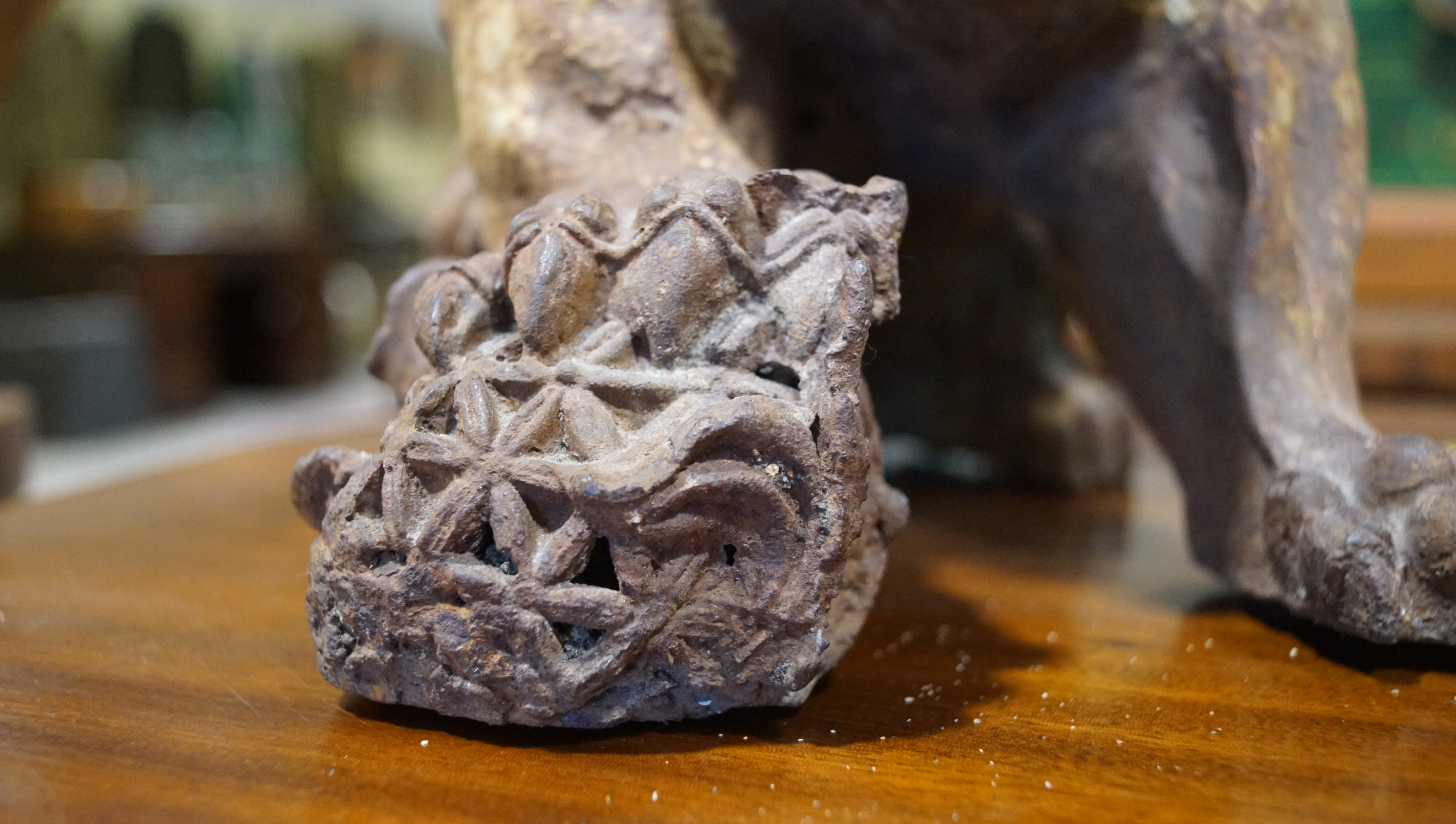 A pair of Chinese cast iron lions, each modelled seated with front paw on a brocaded ball, - Image 7 of 15