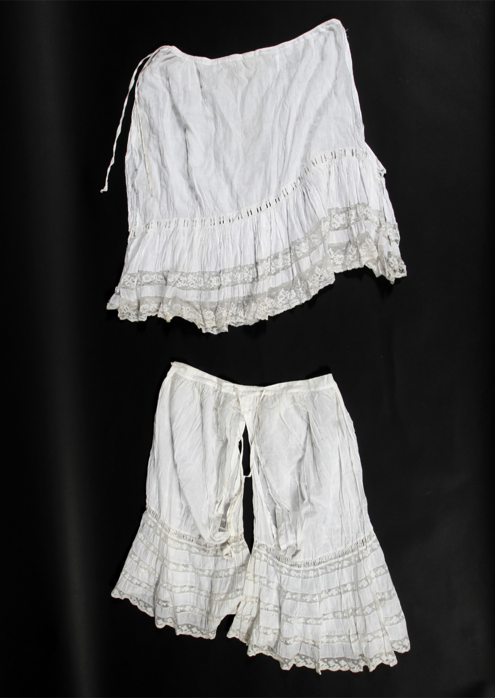 A pair of Victorian brigitta and an underskirt,