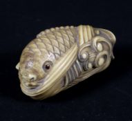 A Japanese Meiji carved ivory netsuke in the form of a koi carp, with signature to base