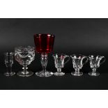 A group of 19th century glassware, including a Regency engraved rummer, three caudle cups,