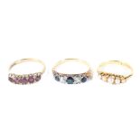 Three assorted 9ct gold dress rings, set with seed pearls, rubies and a sapphire and diamond ring,