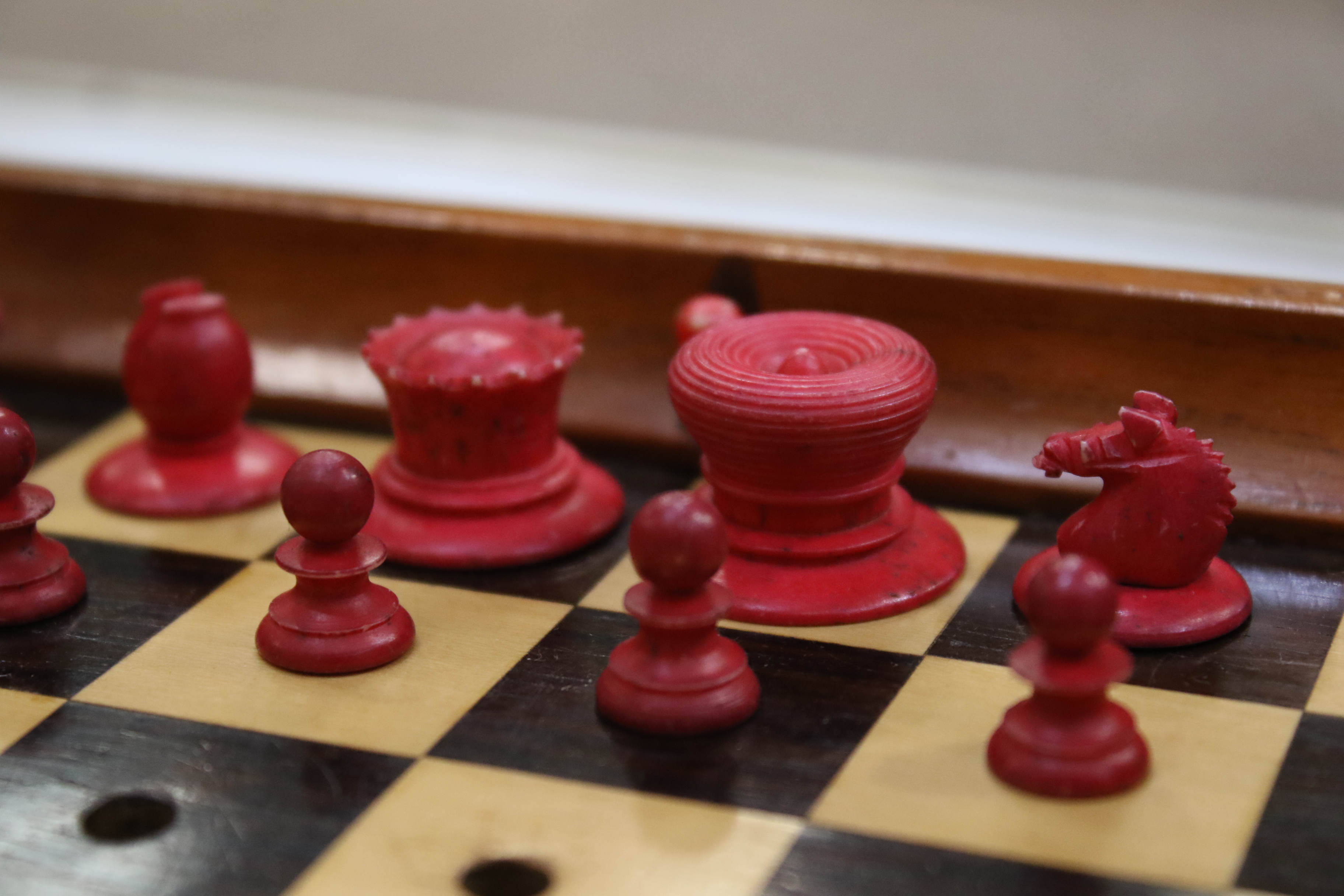 A Jacques & Son (London) travelling chess set in box, with folding mahogany chess board, - Image 5 of 16