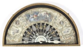 A late 18th century French folding fan, the heavy sticks carved, pierced and gilded,