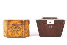A late Victorian mahogany veneered money box and a tea caddy.