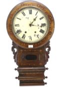 A late 19th/early 20th century mahogany veneer wall clock.