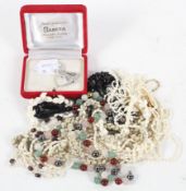 A box of assorted costume jewellery.