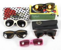 Two pairs of designer sunglasses a Ralf and a Ray Burn with the Olympic emblom Condition