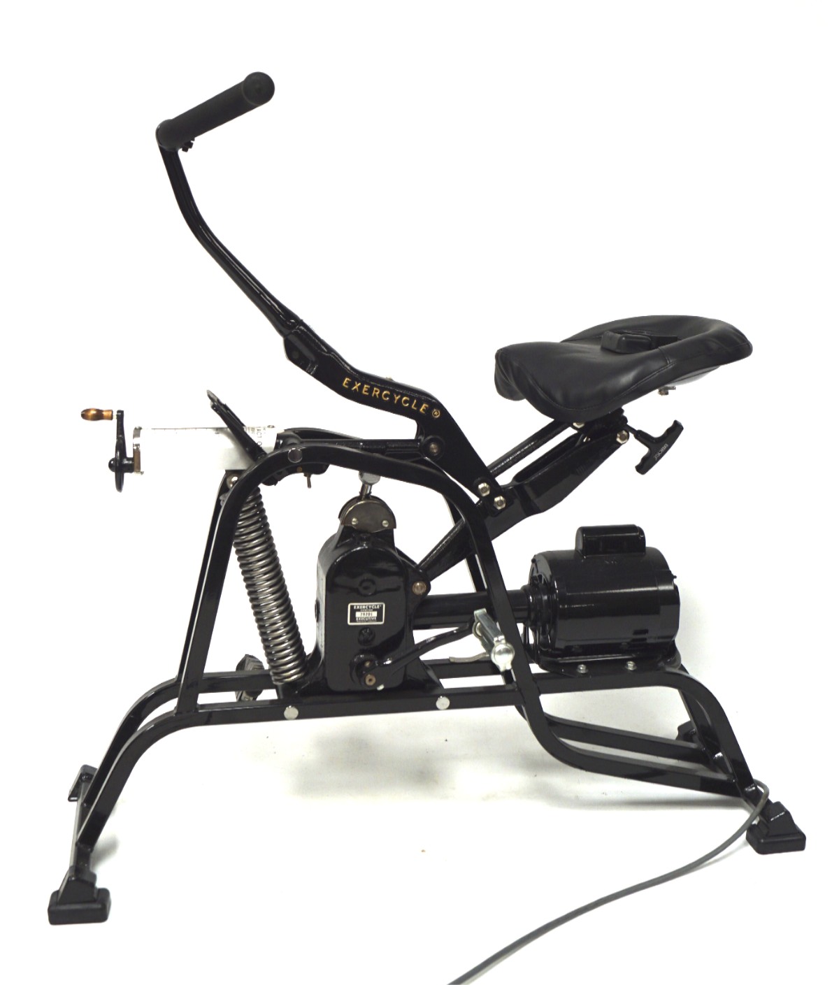 A vintage mid-century Exercycle Exerciser stationary exercise bike.