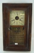 A late 19th/early 20th century Forestville (USA) wall clock.
