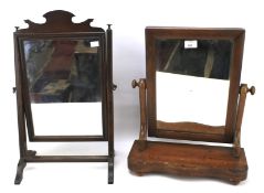 Two 19th century mahogany dressing table swing mirrors.
