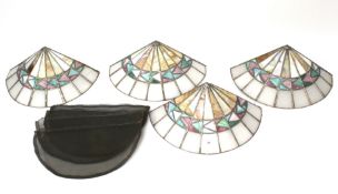 Four vintage Tiffany style fan-shaped glass wall lights.