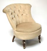 An Edwardian style button back bedroom chair.