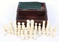 A boxed 19th century ivory chess set of modern design