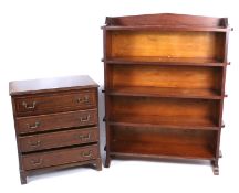 A small inlaid mahogany chest of drawers and a mid-century bookcase.