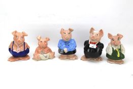 Five Wade Natwest pigs.