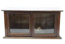 A late 19th century glazed mahogany table top display cabinet. L69.