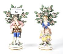 Two late 19th century Samson porcelain bocage figures of a lady and gentleman. Largest 15.