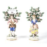 Two late 19th century Samson porcelain bocage figures of a lady and gentleman. Largest 15.