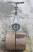 A cast iron roller marked Cater Stoffell & Fortt Ltd of Bath