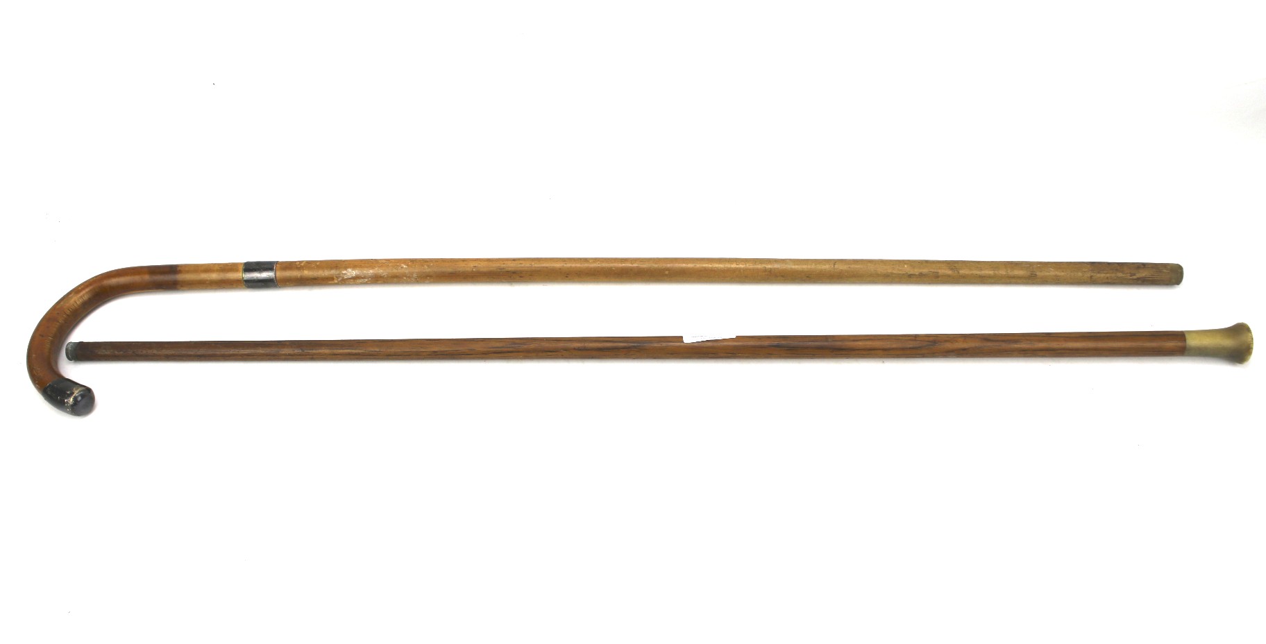 Two early 20th century walking canes.