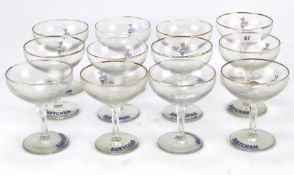 A collection of twelve circa 1950s Babycham glasses.