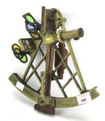 A West German brass and metal sextant.