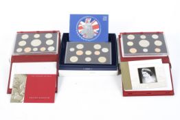 Three Royal Mint proof coin collections for the years 2002, 2003 & 2004.