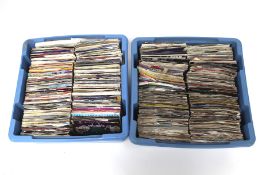 An extensive collection of vintage vinyl 45's singles spread over two boxes