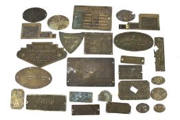 An assortment of metal plaques for engines and motors.