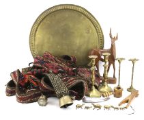 An assortment of brass collectables including camel harnesses,