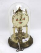 A German Kundo Kieninger and Obergfell brass anniversary clock.