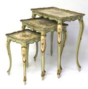 A nest of three 20th century painted tables.