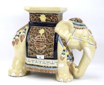 A majolica jardiniere stand in the form of an Indian elephant.