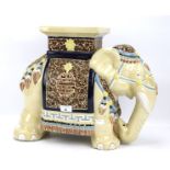 A majolica jardiniere stand in the form of an Indian elephant.