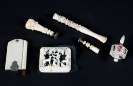 A small collection of late 19th century carved ivory items.