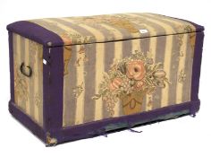 A 20th century upholstered ottoman trunk.