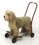 A vintage ride-on toy dog by Pedigree Soft Toys Ltd.