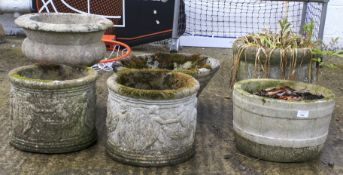 An assortment of garden pots, some with moulded decoration.