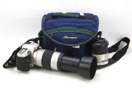 Minolta Dynax 5/35mm camera and telephoto lens in a case