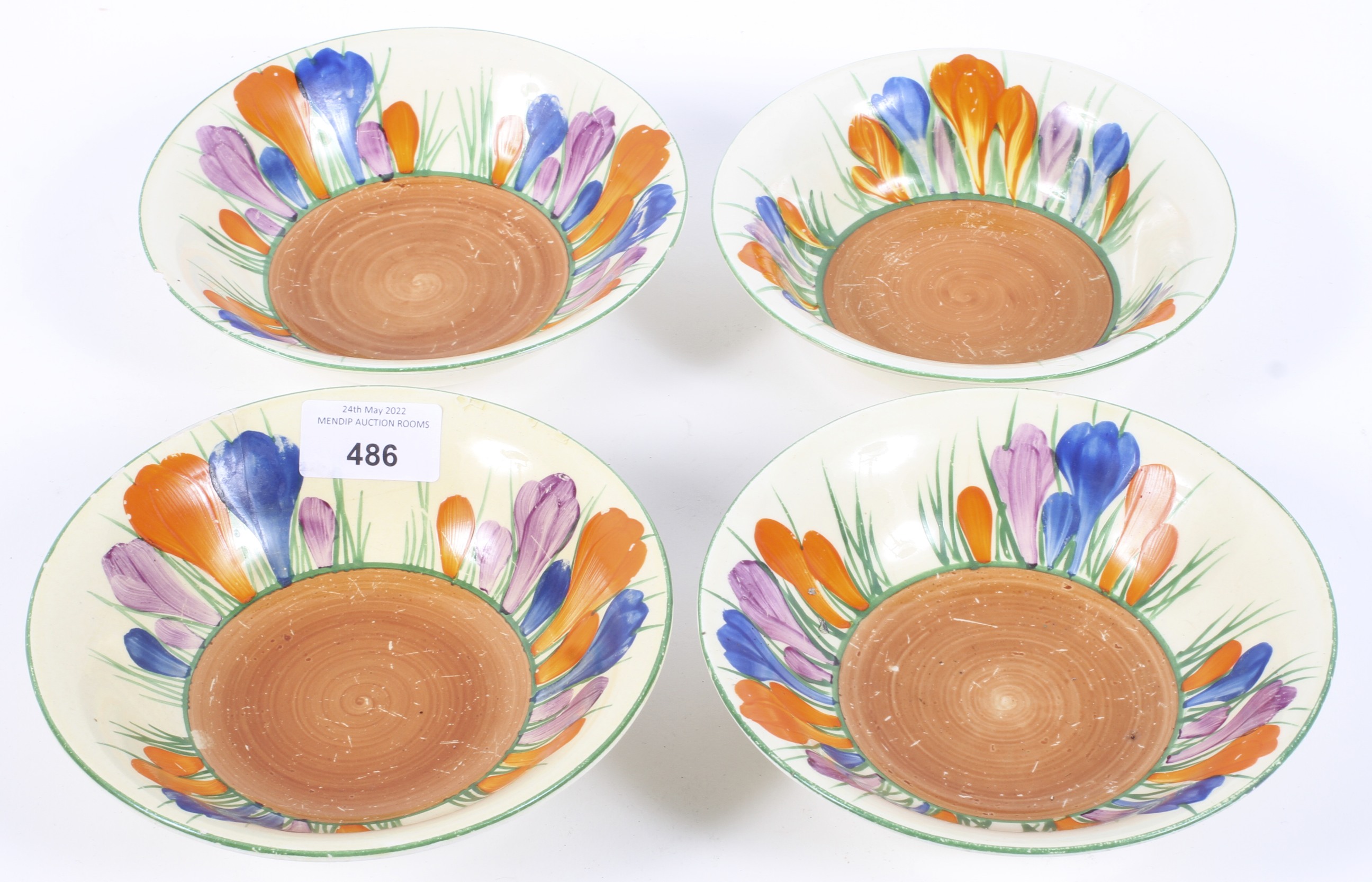 Four Clarice Cliff crocus pattern dessert bowls from the Bizzare range Condition Report: