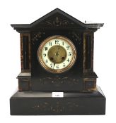 A 19th century slate marble inlaid mantel clock.