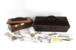 An oak and inlaid jewellery box and a mahogany cutlery tray with a selection of flatware.