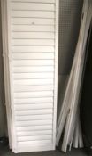 Four white MDF window shutters and fixings.